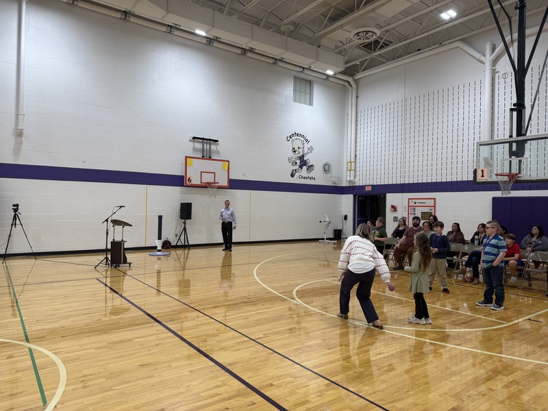 Dr. Thurwanger tossing the ball for The Impossible Shot