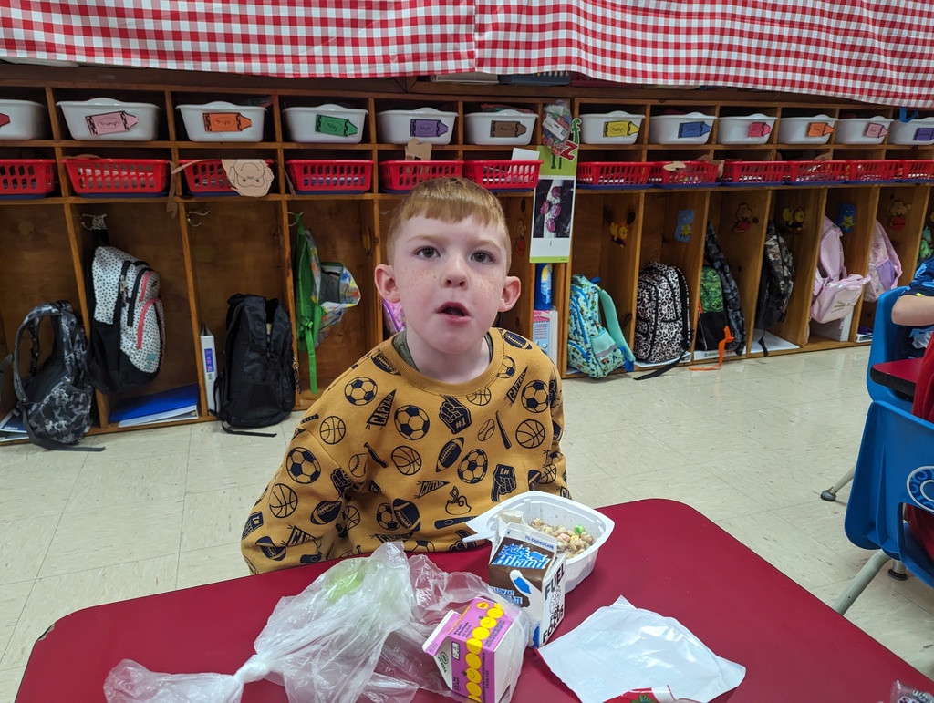 Miss Amy's kindergarten class is enjoying their free breakfast