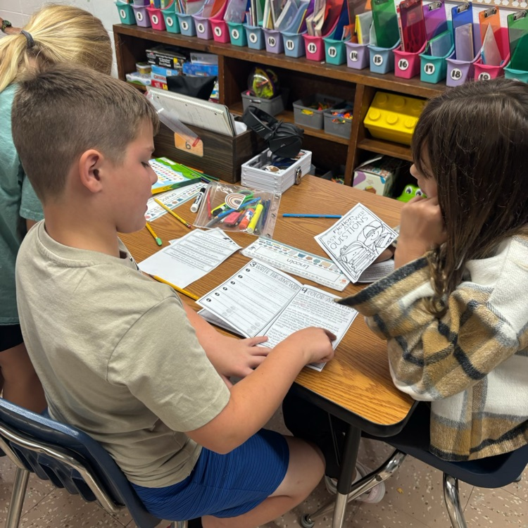 Mrs. Collier’s 3rd graders rotated through different stations and used the RACE strategy to answer response questions. 