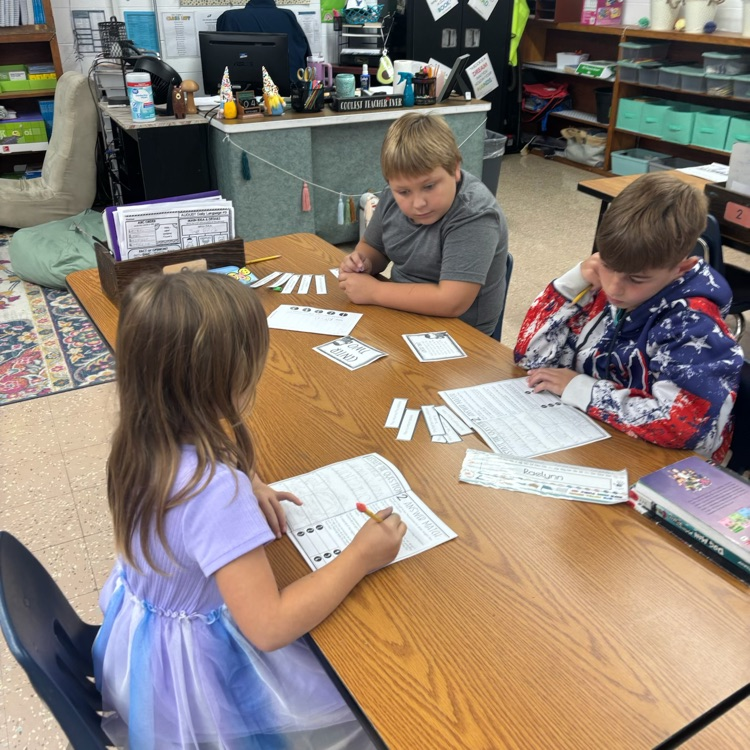 Mrs. Collier’s 3rd graders rotated through different stations and used the RACE strategy to answer response questions. 