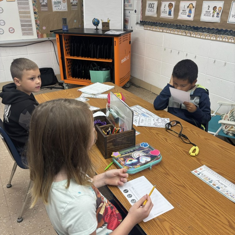Mrs. Collier’s 3rd graders rotated through different stations and used the RACE strategy to answer response questions. 