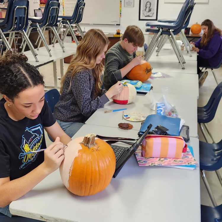 Mrs. Reck's Sculpture class is sculpting their pumkins getting ready for Halloween.