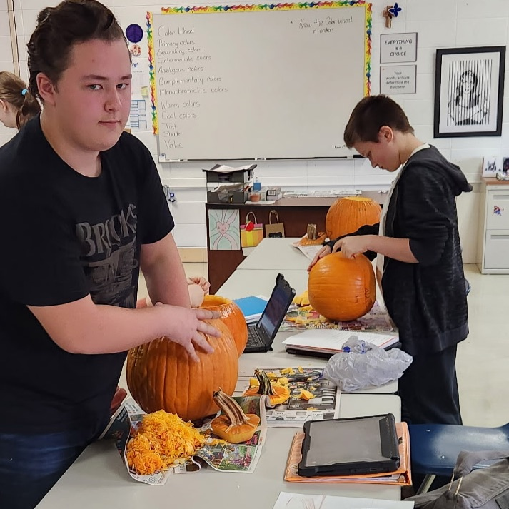 Mrs. Reck's Sculpture class is sculpting their pumkins getting ready for Halloween.