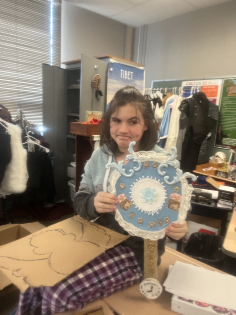 Set design class making clocks for Pinocchio!