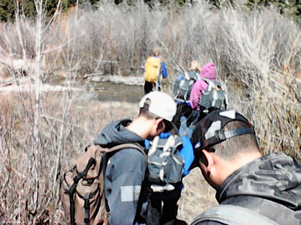 Science students visiting Kelley Campus learning about animal adaptations and bird migrations.