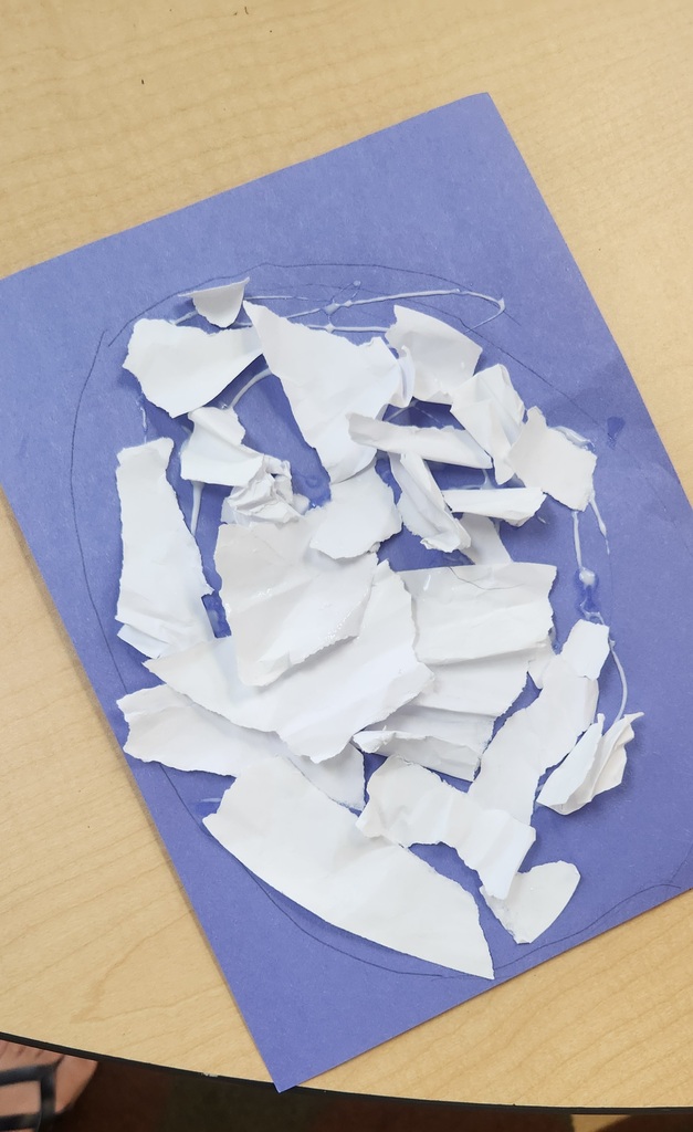 Kindergarten students attempting to put Humpty Dumpty together again!