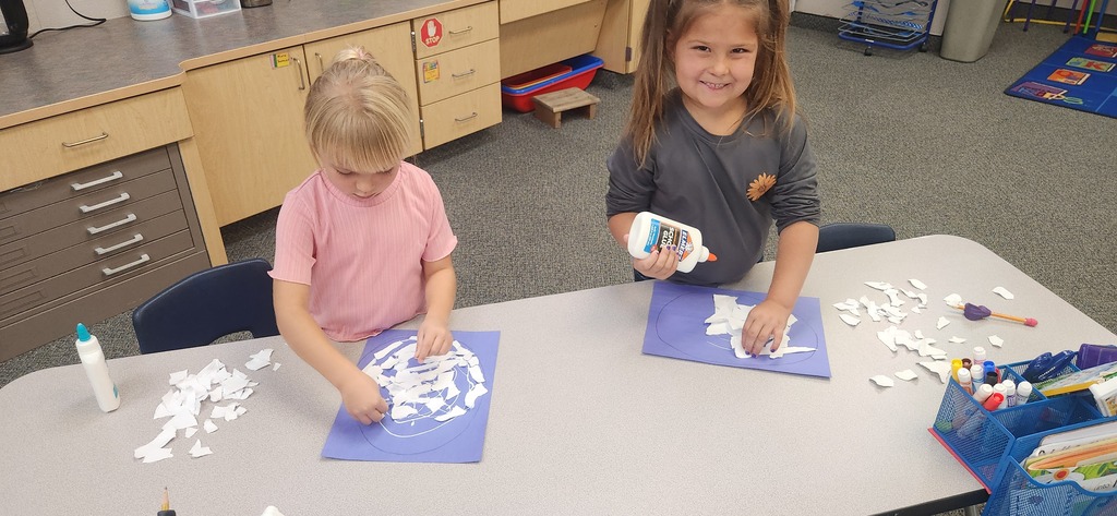 Kindergarten students attempting to put Humpty Dumpty together again!