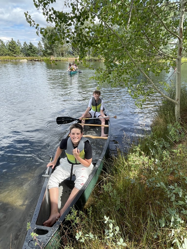 2 boys canoeing at 100 Elk