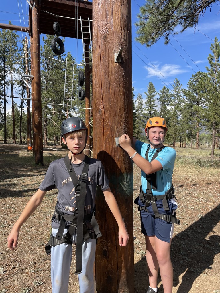 two boys on ropes course