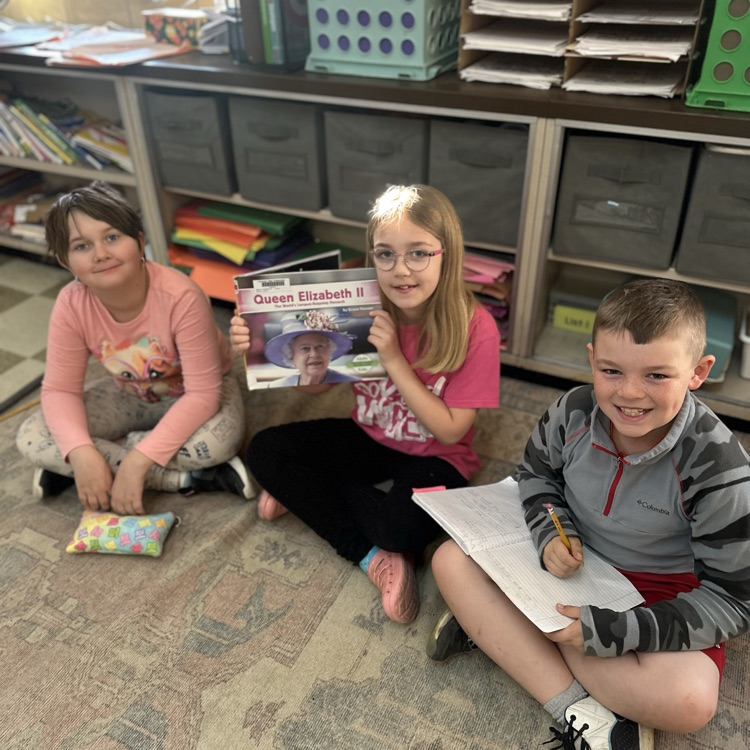 Mrs.McGrady’s Third Graders enjoying some biographies.