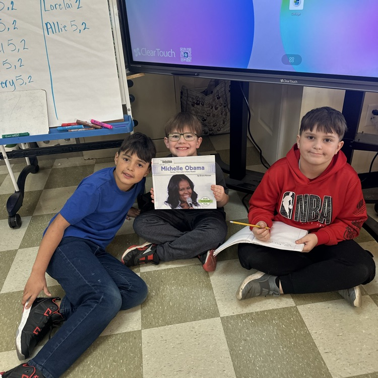 Mrs.McGrady’s Third Graders enjoying some biographies.