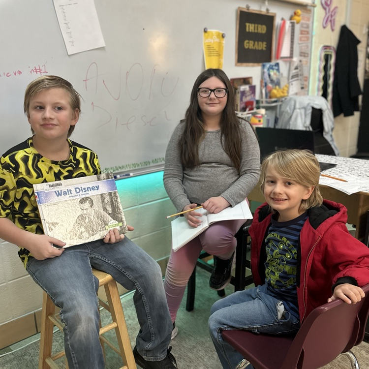 Mrs.McGrady’s Third Graders enjoying some biographies.