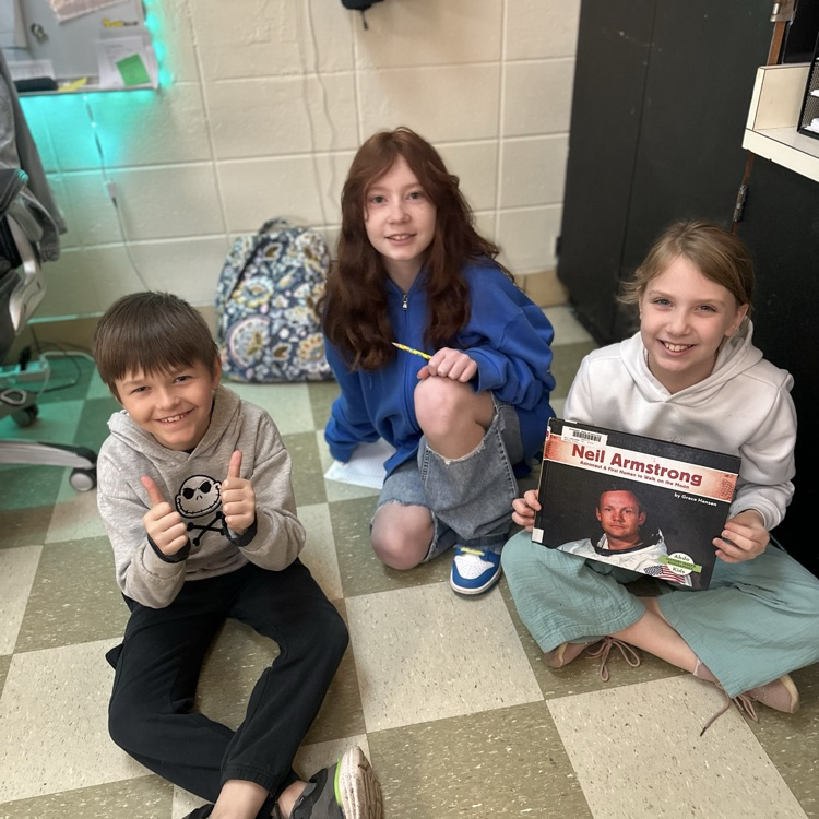 Mrs.McGrady’s Third Graders enjoying some biographies.