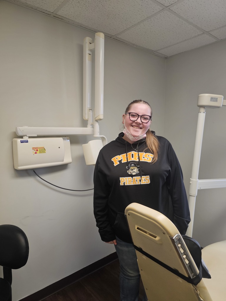 Emalie learns about dentistry. 