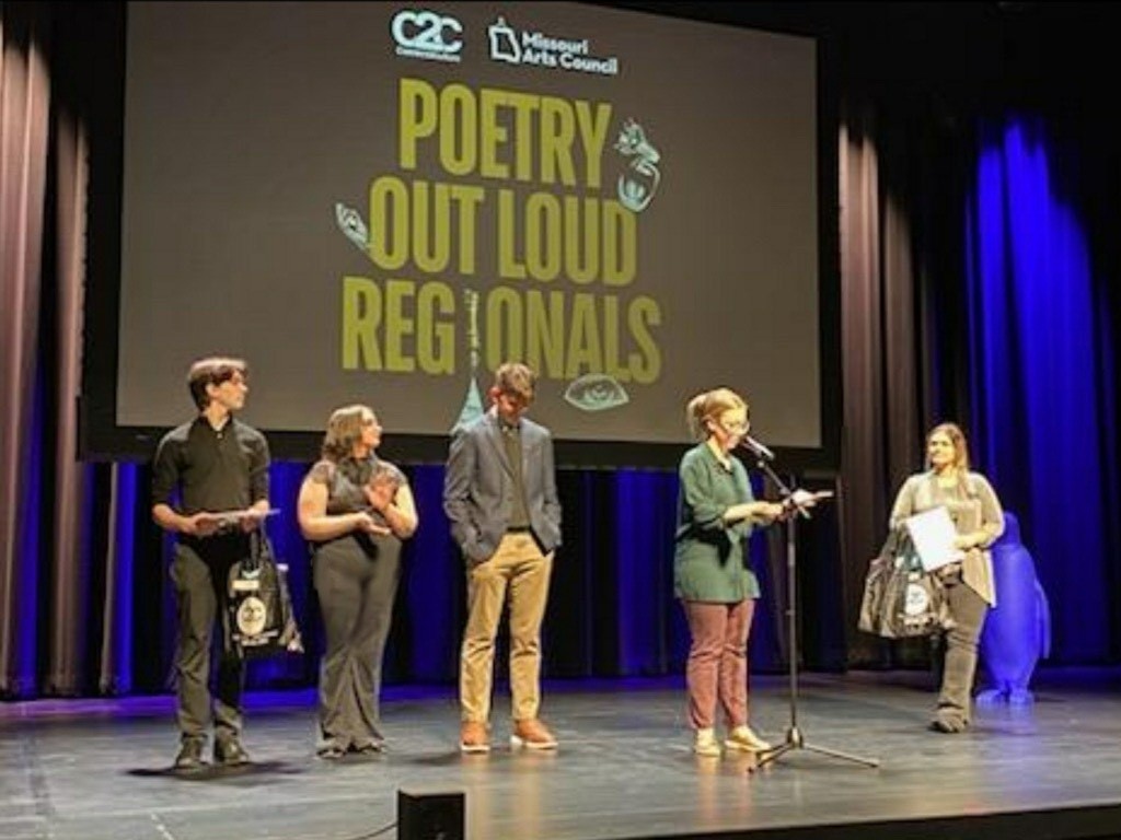Students wait for the announcement of the winner. 