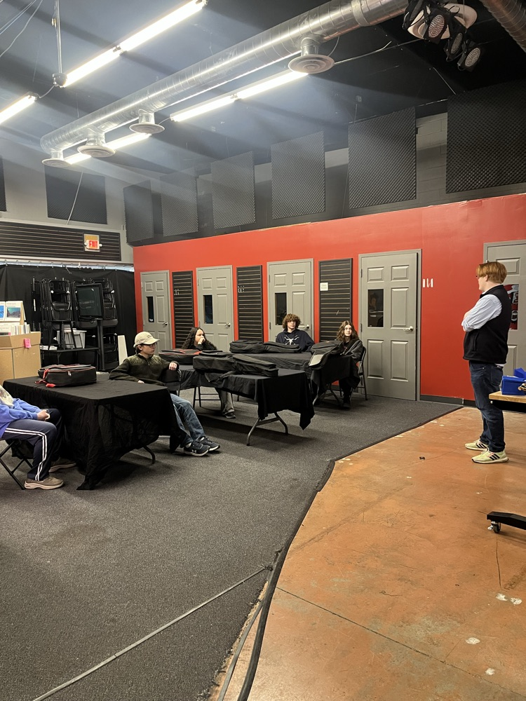 Guitar students learning about different career fields in music