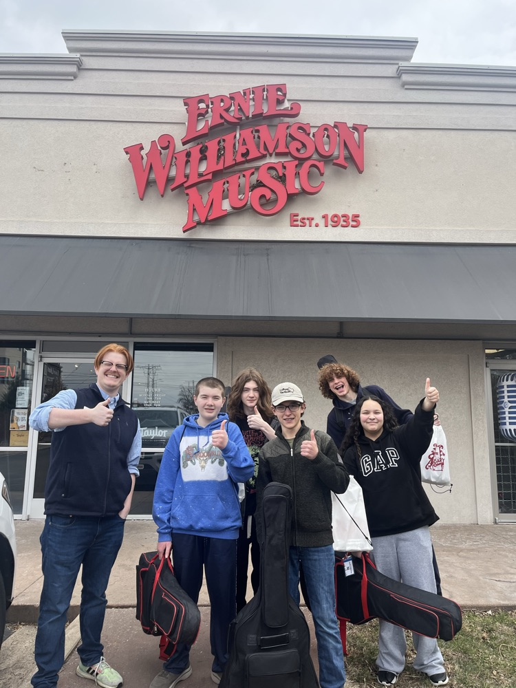 Guitar students at Ernie Williamson music