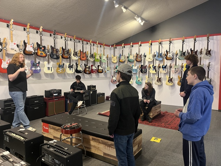 Guitar students learning about various amps