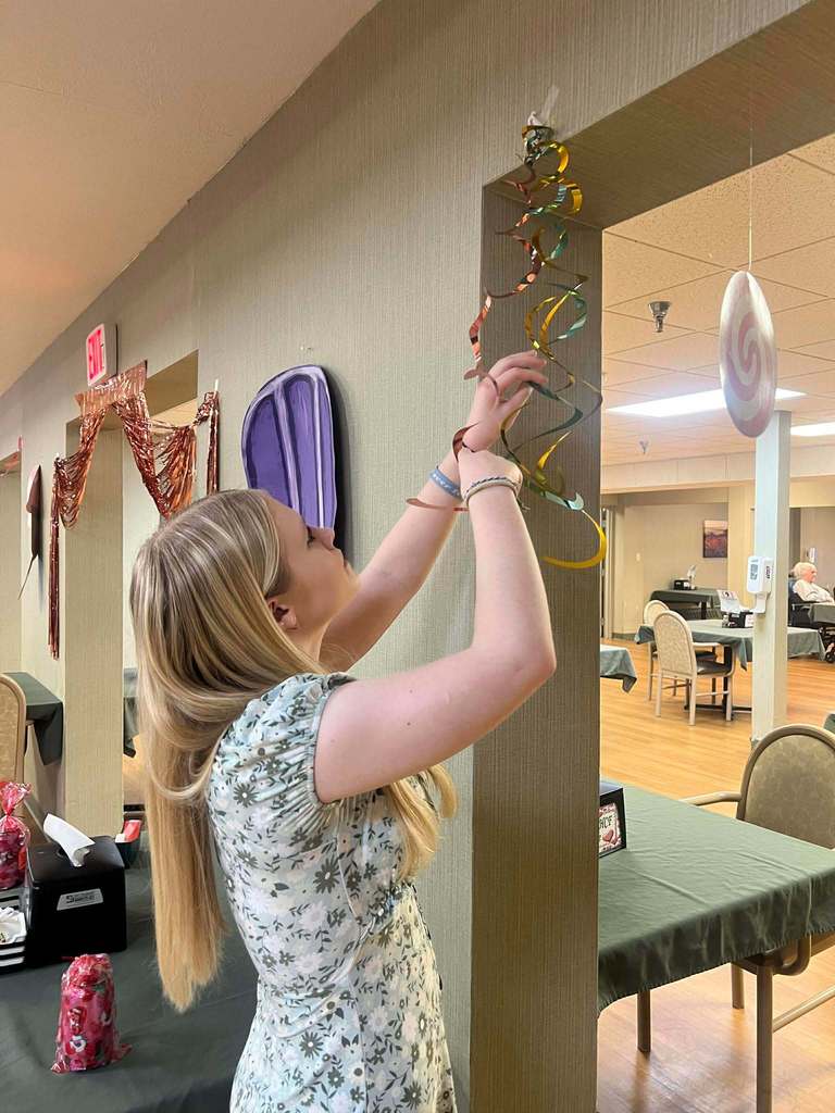 Student decorate for the party. 