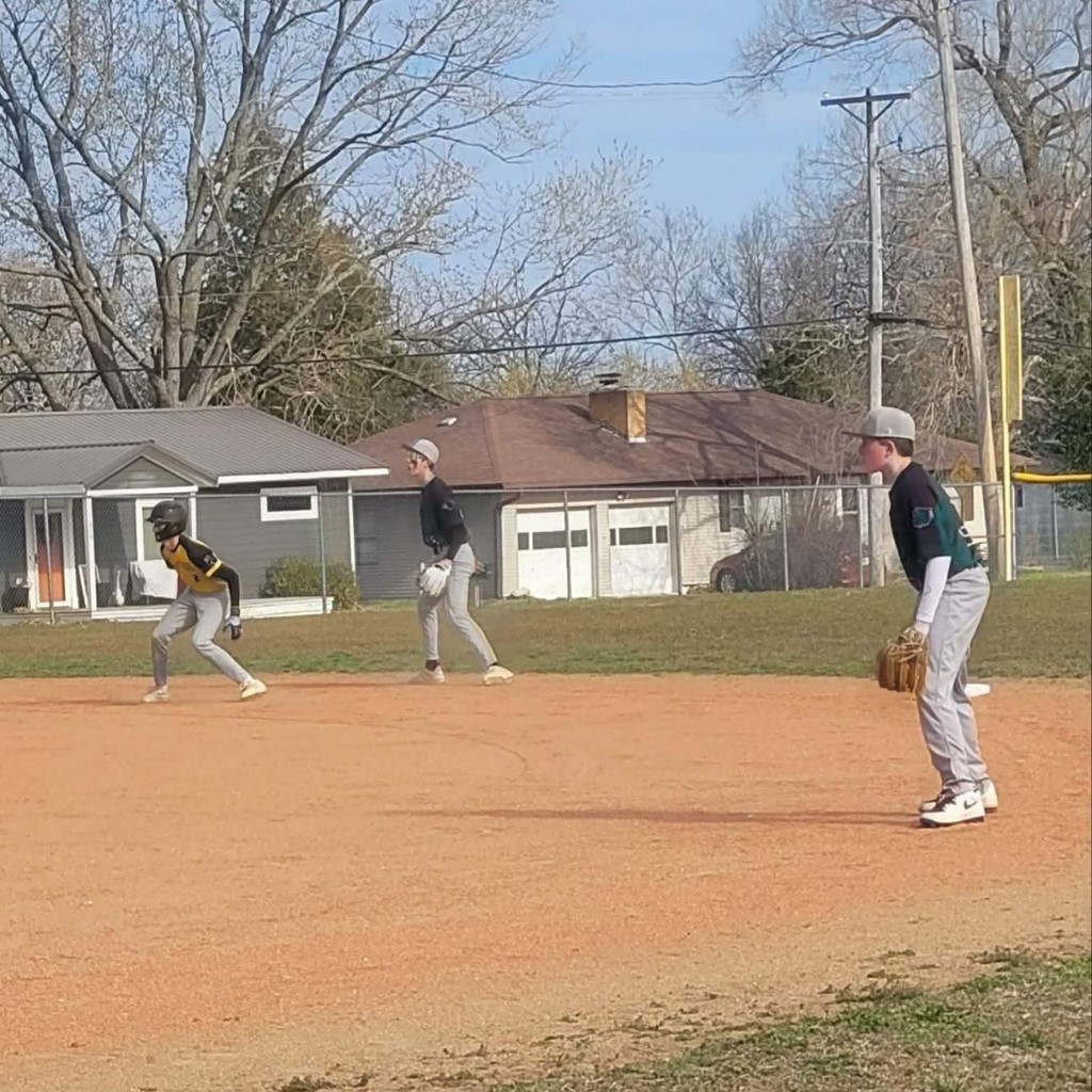baseball players on the infield