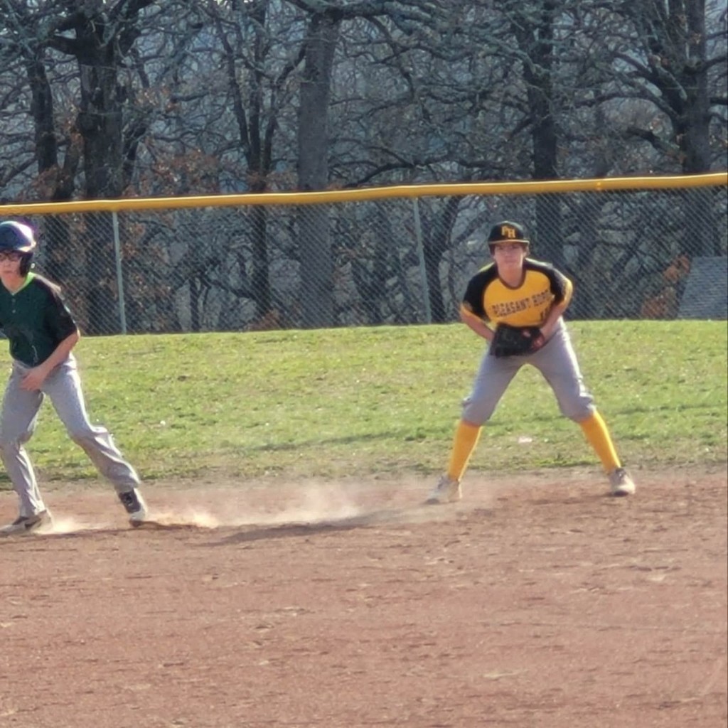 baseball players on the infield