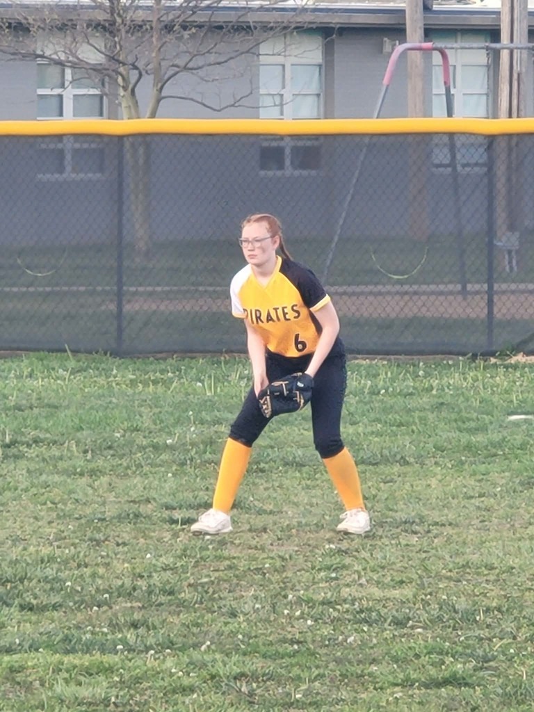 ms softball player in the outfield