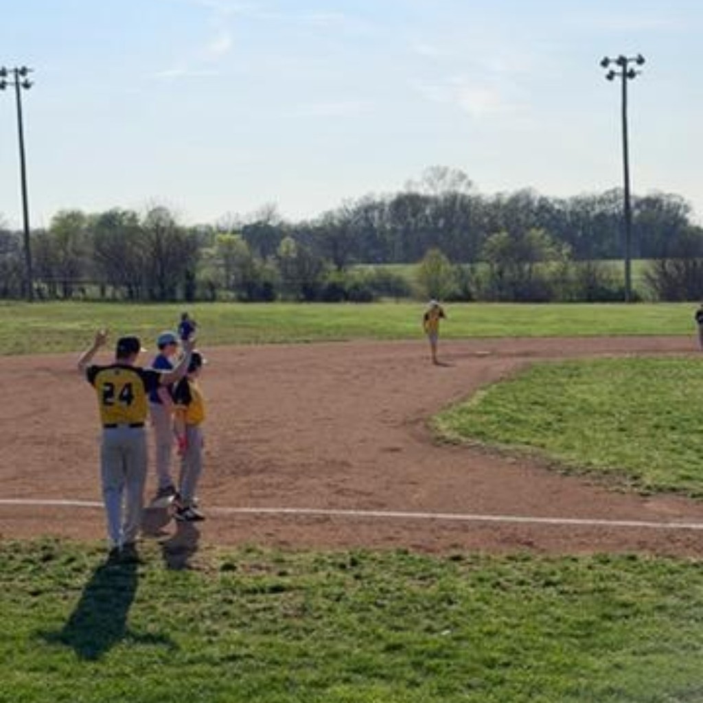 baseball players on the infield