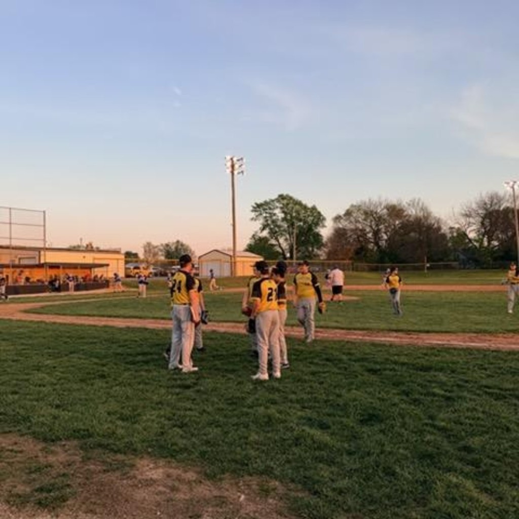 baseball players coming off the field