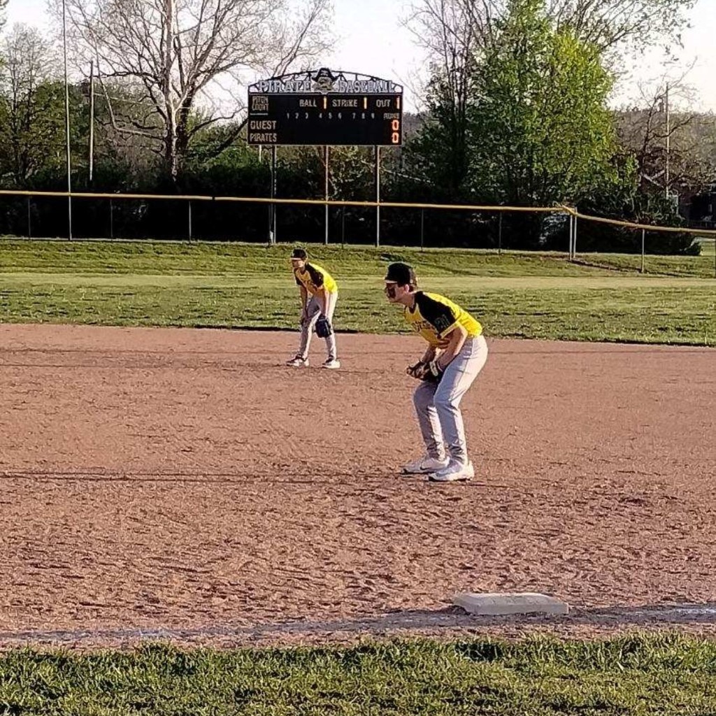 baseball players on the infield 