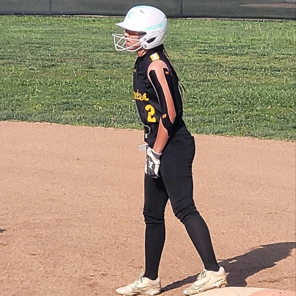 softball player on 1st base