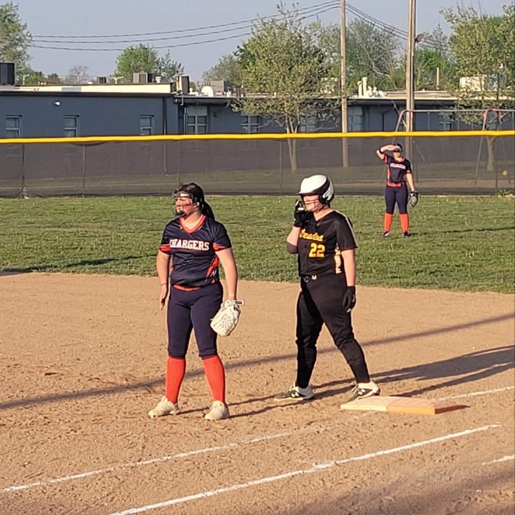 softball players at 1st base