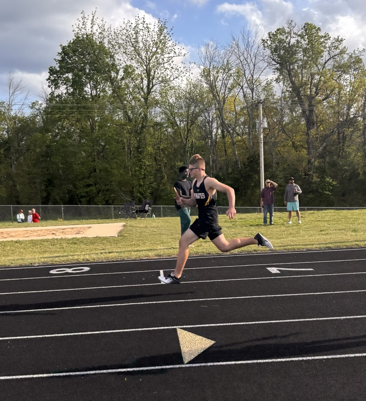 Andrew running the first leg of the 4x1