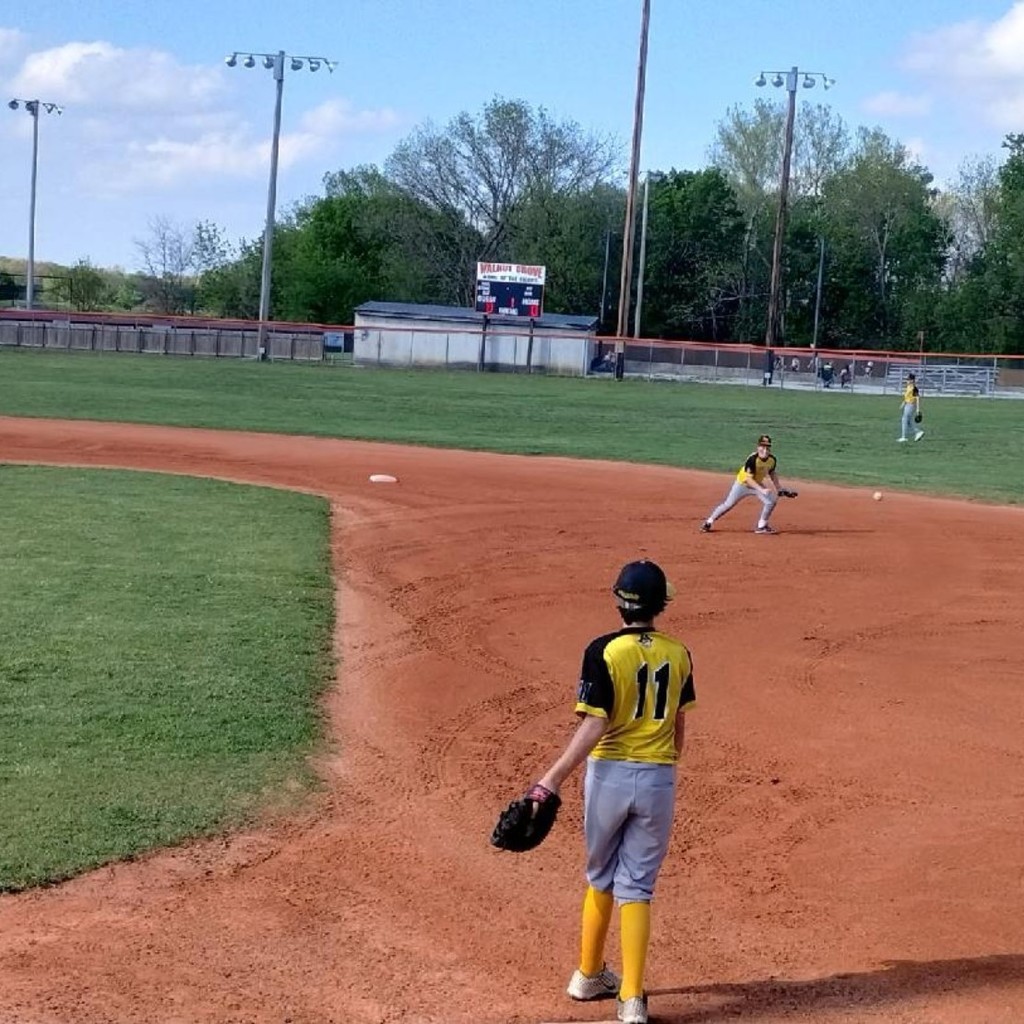 pleasant Hope baseball players on the infield 