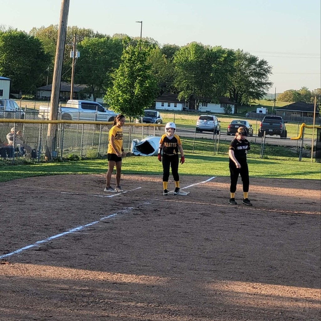 pleasant hope coach and player at 3rd base 