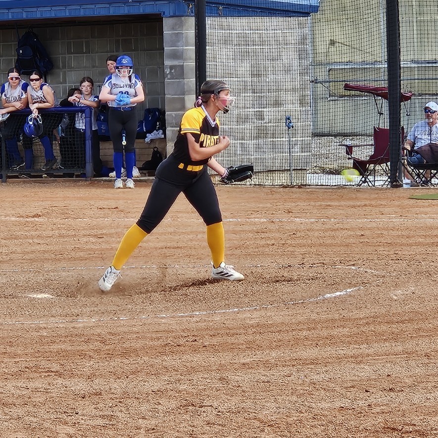 pleasant hope middle school softball player pitching the ball 