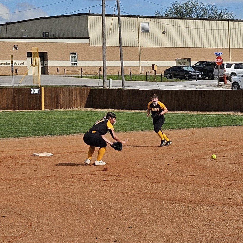 Pleasant Hope middle school softball player fielding a ground ball