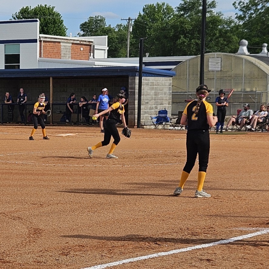 Pleasant Hope middle school softball player pitching 