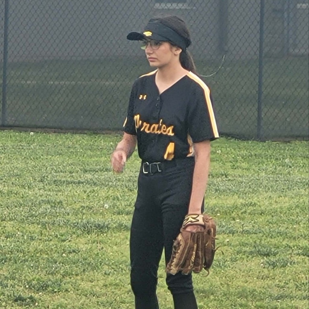 softball player in the outfield 
