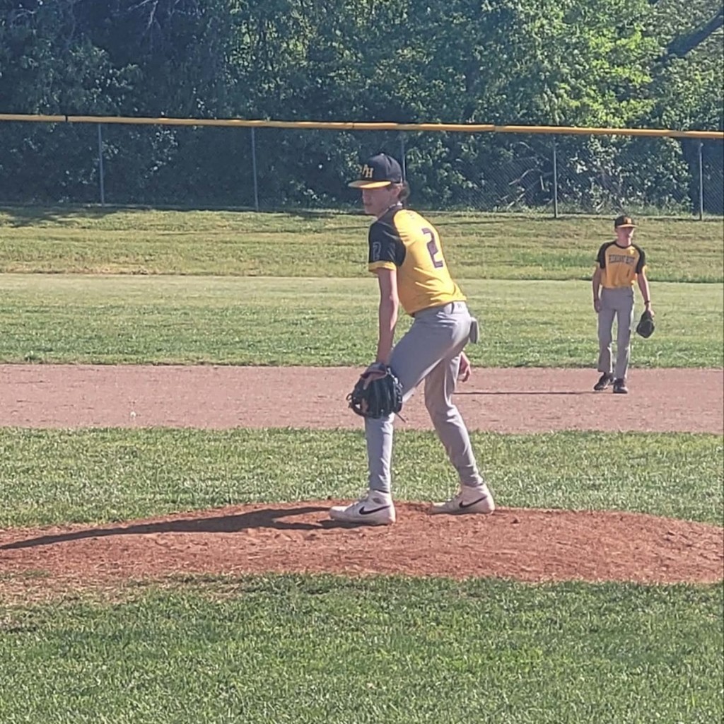 MS baseball player getting ready to pitch 