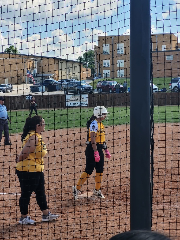 ms softball player on 3rd base and the coach