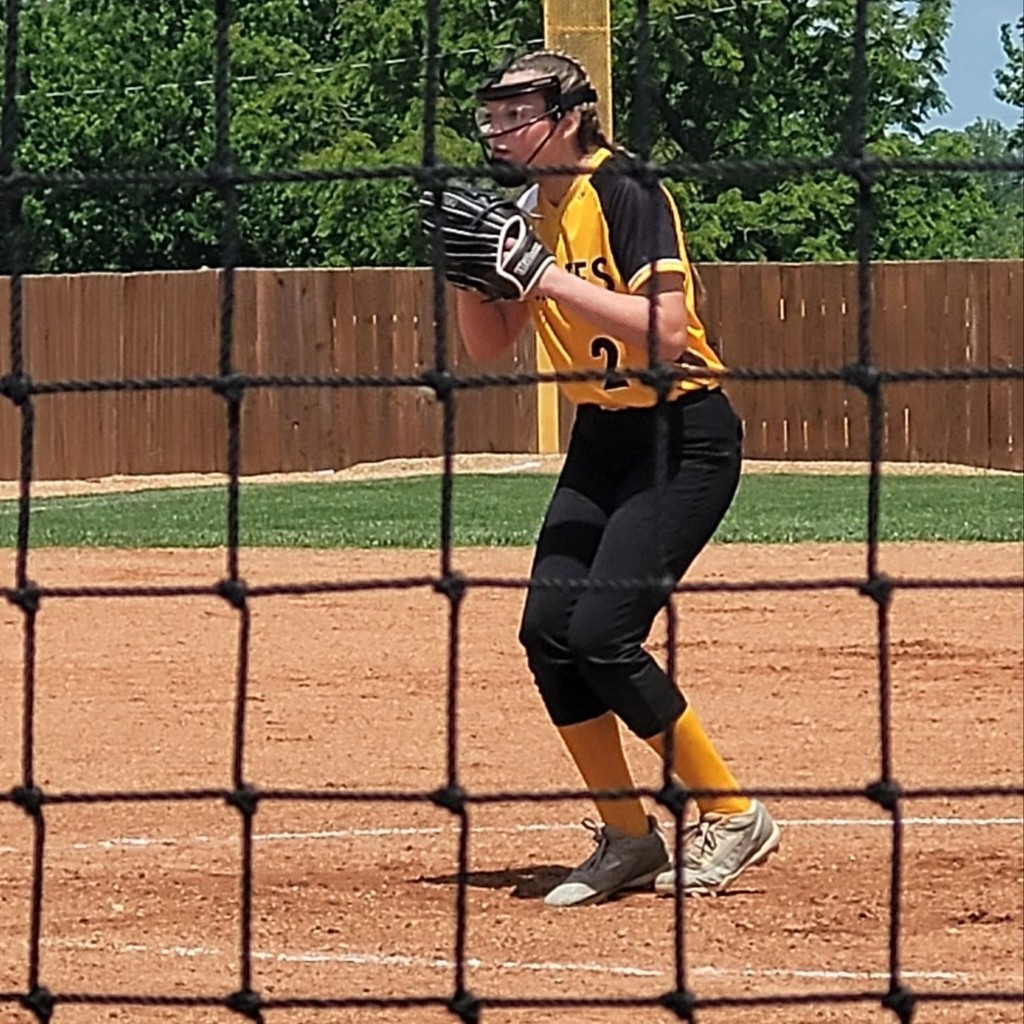 MS softball player pitching 