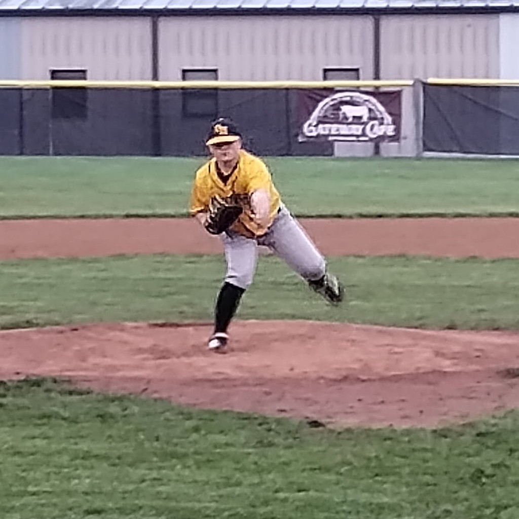 hs baseball player pitching 