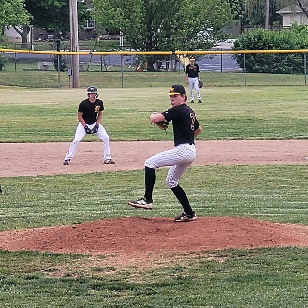 hs baseball player pitching 