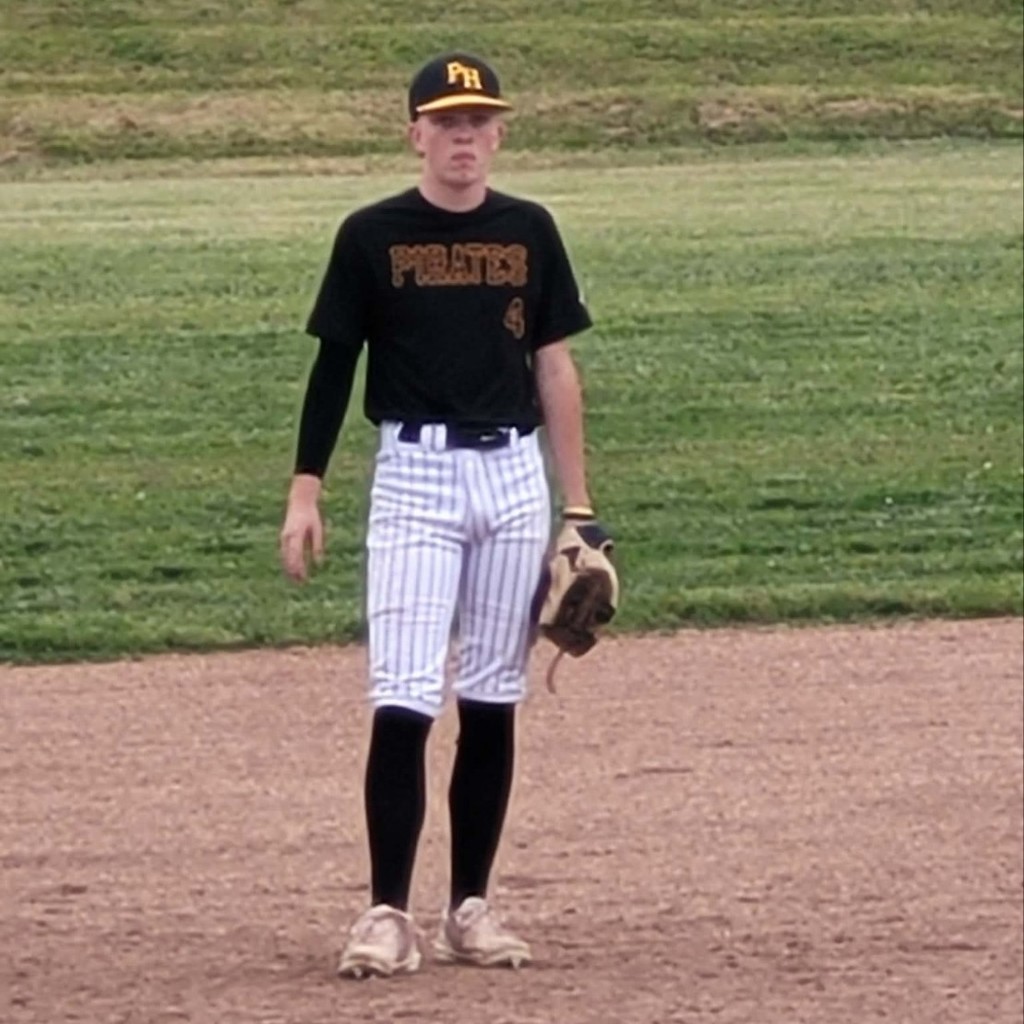 hs baseball player on the infield 