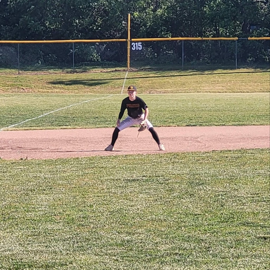hs baseball player at 3rd base