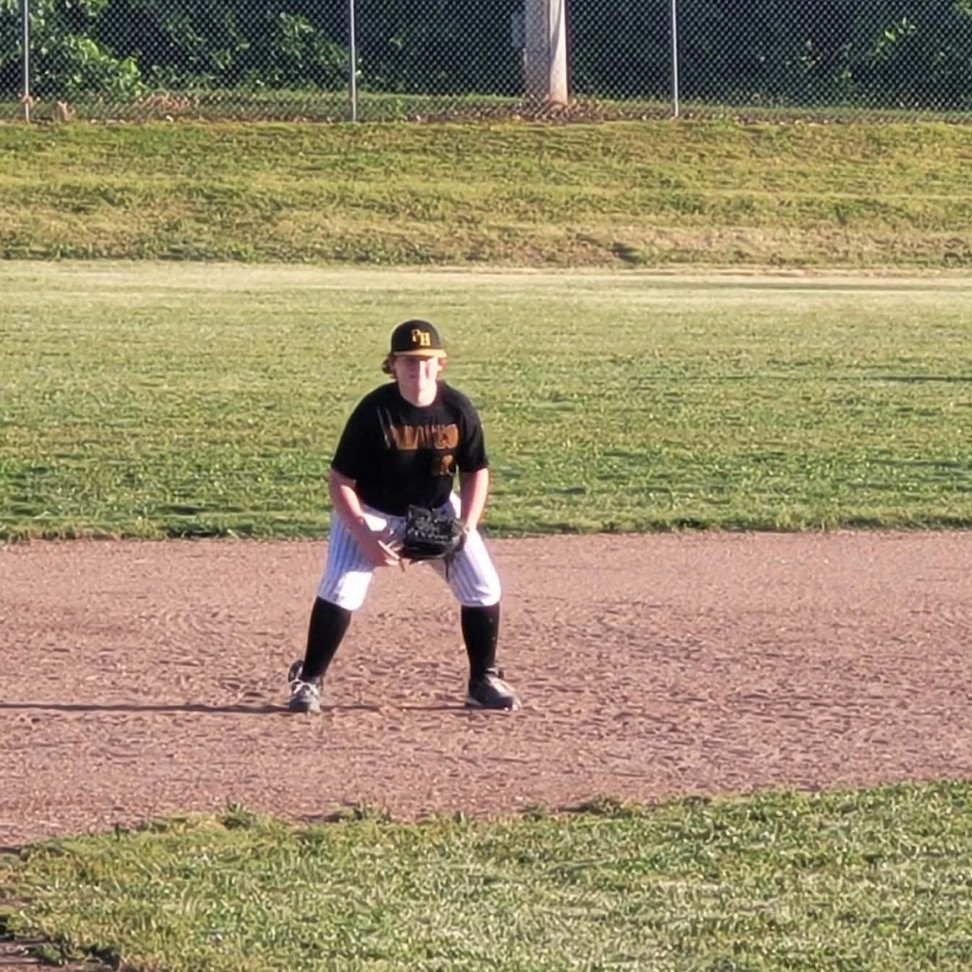 hs baseball player on the infield