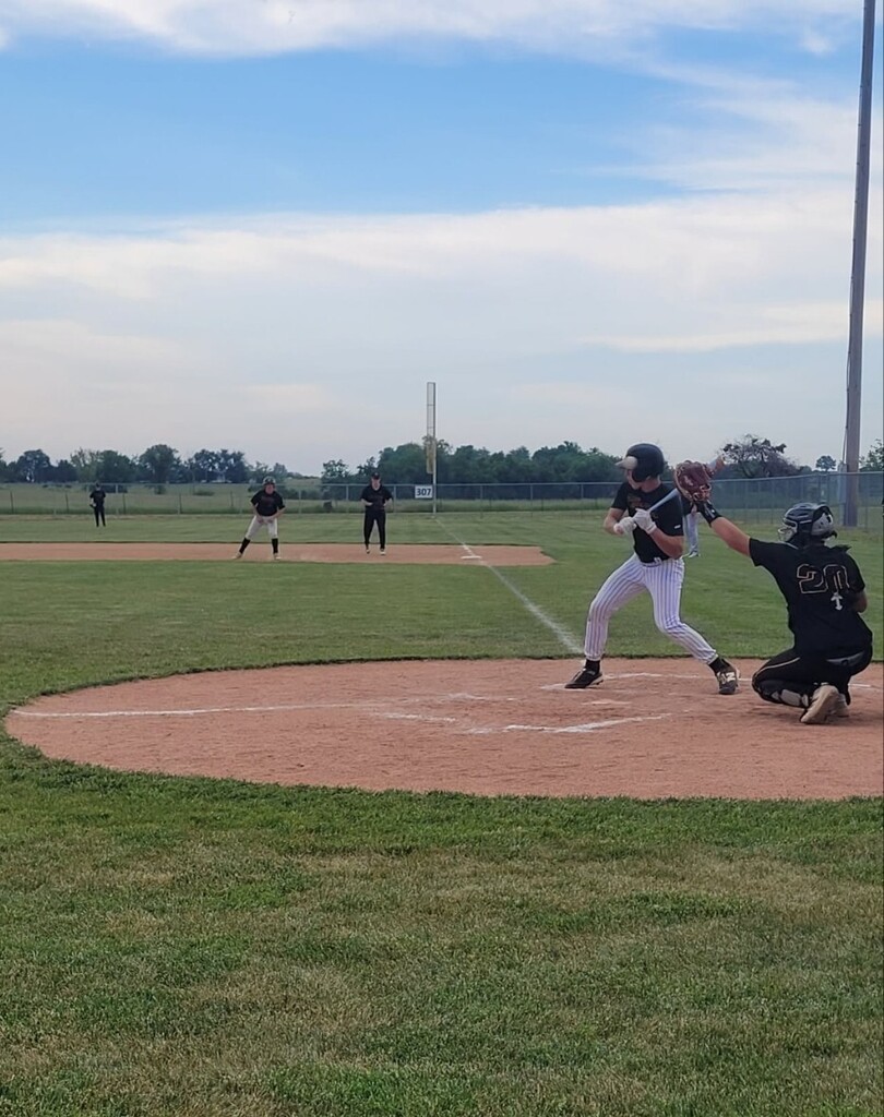 hs baseball player batting 
