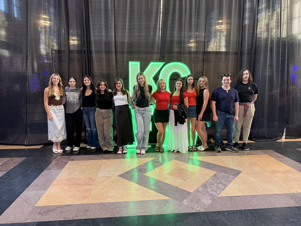 Group photo with KCFW sign