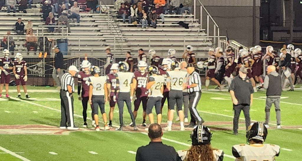 Captains at pregame coin toss