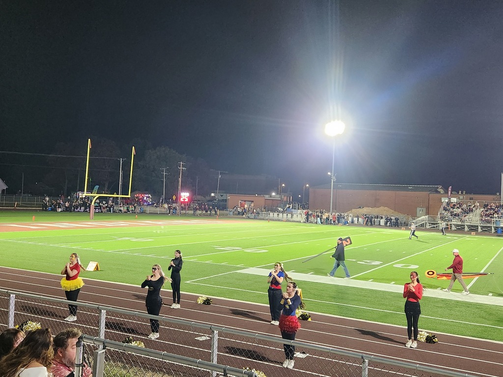 Cheerleaders performing a cheer